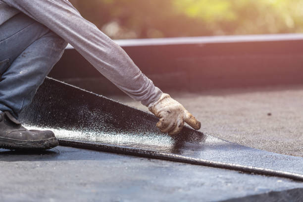 Professional Basement Waterproofing technician working in Marquette, MI